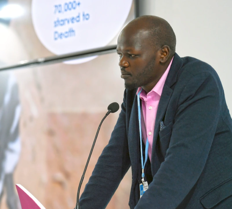 person giving a speech at the african climate mobility conference